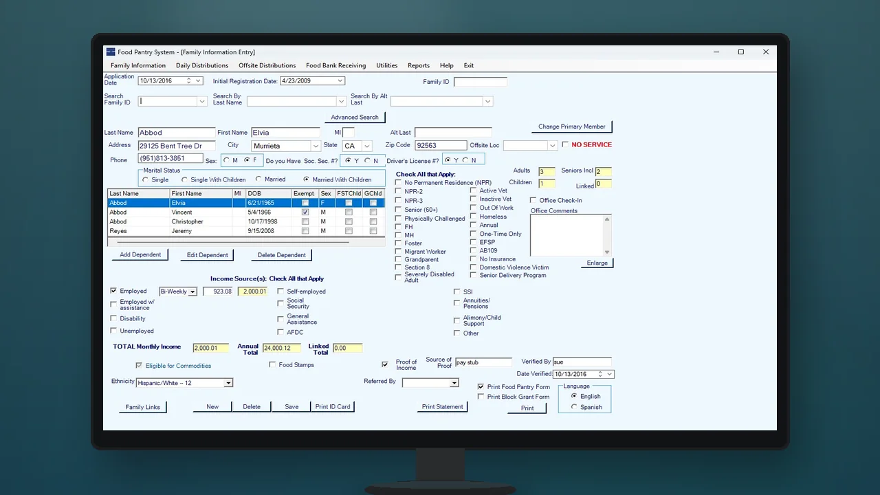 Food Pantry System Family Information Entry on a desktop monitor — household, dependents, income, and eligibility